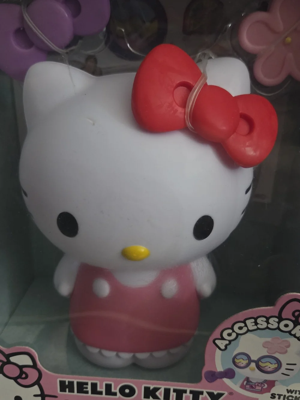 Hello Kitty Pink Figure with Red Bow and Purple Accessories